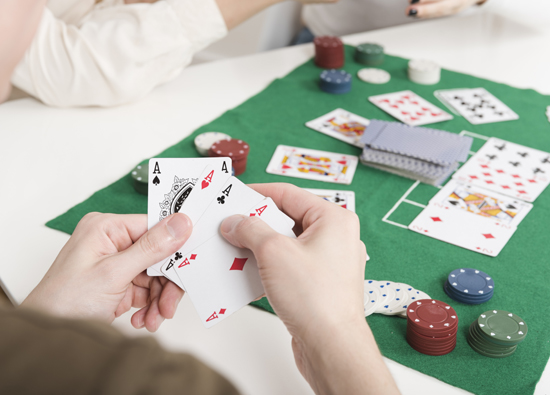 Understanding the Game of Life Within the Small Table of a Card Game
